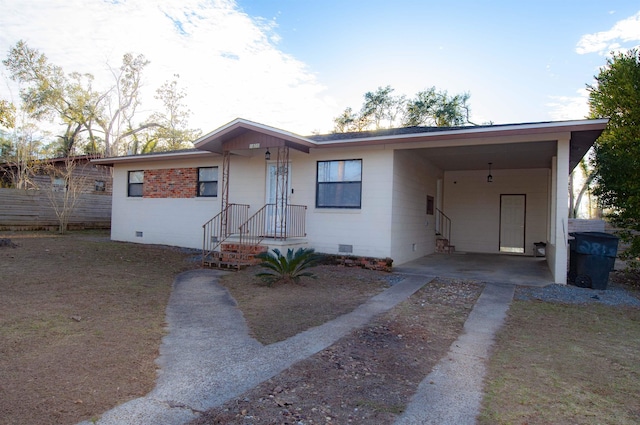 single story home with a carport