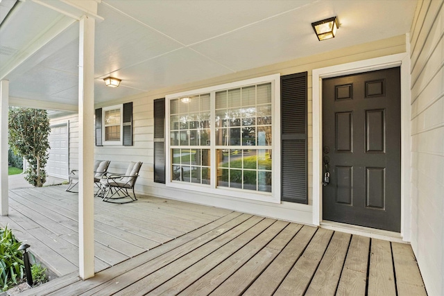 wooden deck featuring a porch