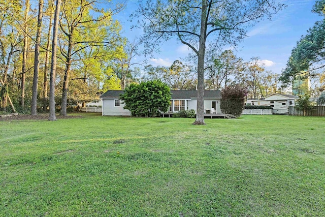 view of yard featuring fence