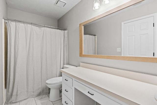full bathroom featuring toilet, visible vents, and vanity