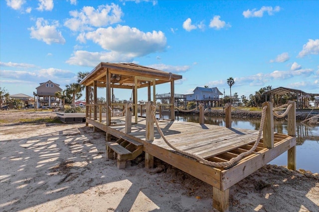 view of dock with a water view