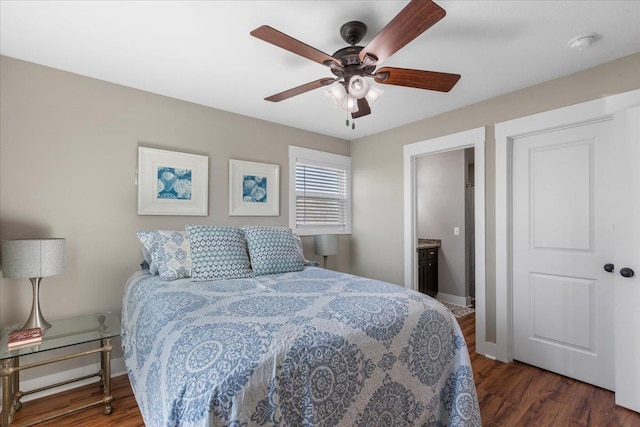 bedroom featuring dark wood-type flooring and ceiling fan