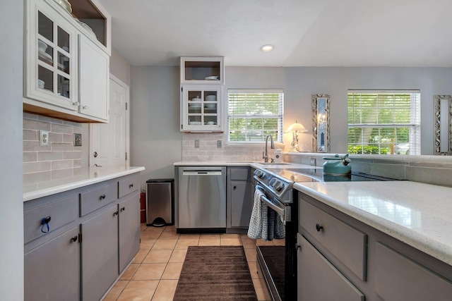 6509 Alan A Dale Trl, Tallahassee, FL 32309 - kitchen featuring stainless steel appliances, gray cabinets, plenty of natural light, and recessed lighting