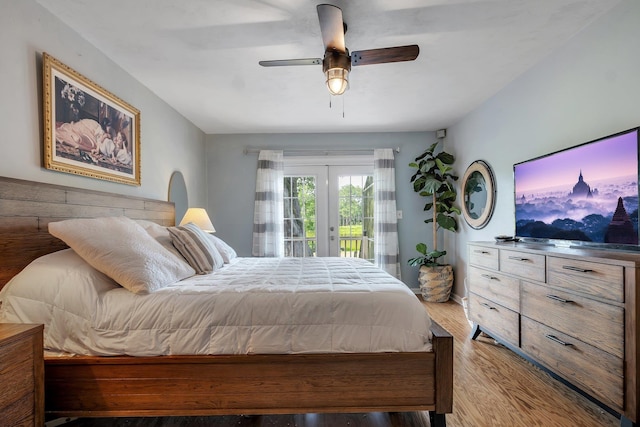6509 Alan A Dale Trl, Tallahassee, FL 32309 - bedroom with access to exterior, french doors, wood finished floors, and a ceiling fan