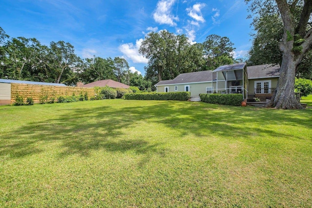 6509 Alan A Dale Trl, Tallahassee, FL 32309 - view of green lawn with french doors
