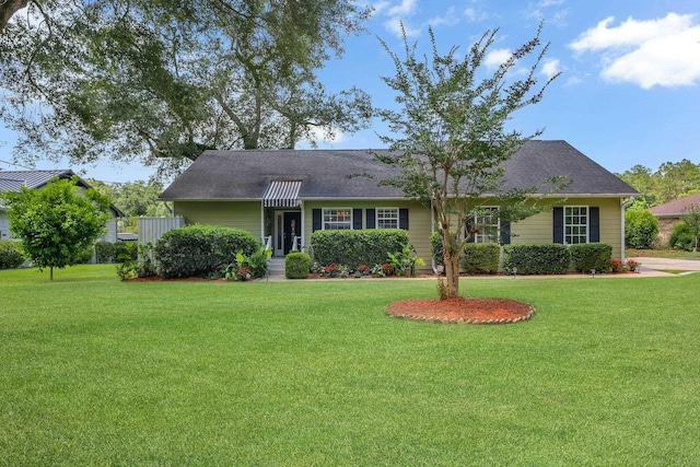 6509 Alan A Dale Trl, Tallahassee, FL 32309 - view of front facade with a front lawn
