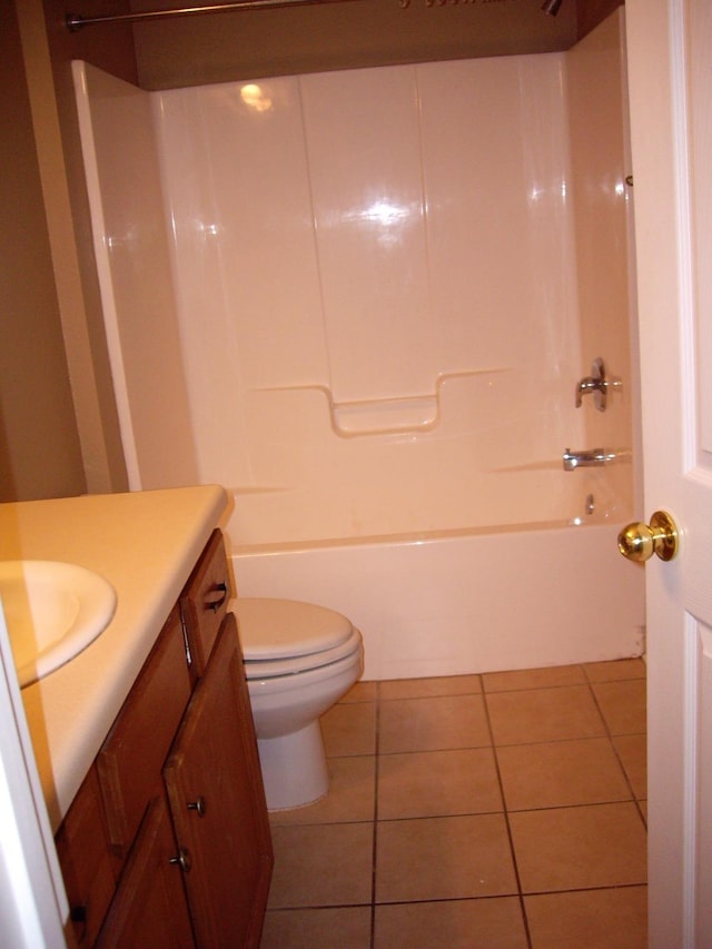 full bathroom featuring toilet, shower / bath combination, tile patterned floors, and vanity