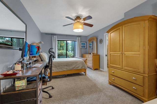 3412 Edgemont Trl, Tallahassee, FL 32312 - bedroom with light carpet, a ceiling fan, an office area, and arched walkways
