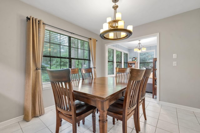 3412 Edgemont Trl, Tallahassee, FL 32312 - dining room with a chandelier and light tile patterned floors