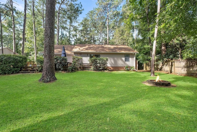 3412 Edgemont Trl, Tallahassee, FL 32312 - view of yard with a fire pit and a wooden deck