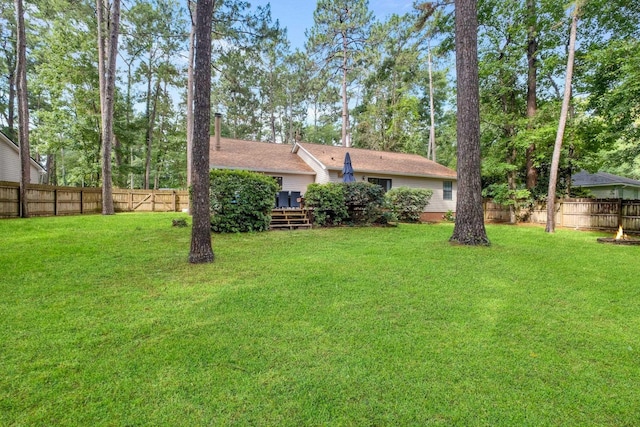 3412 Edgemont Trl, Tallahassee, FL 32312 - rear view of property with a fenced backyard and a deck