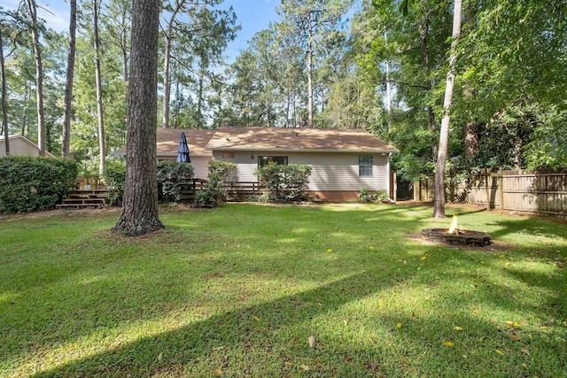 3412 Edgemont Trl, Tallahassee, FL 32312 - back of house with an outdoor fire pit and a deck