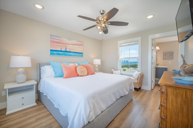 bedroom featuring ceiling fan and light wood-type flooring