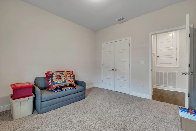 living area with carpet floors