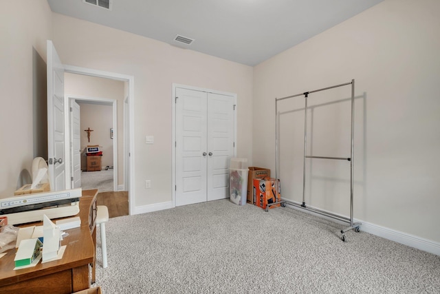 interior space featuring carpet and a closet