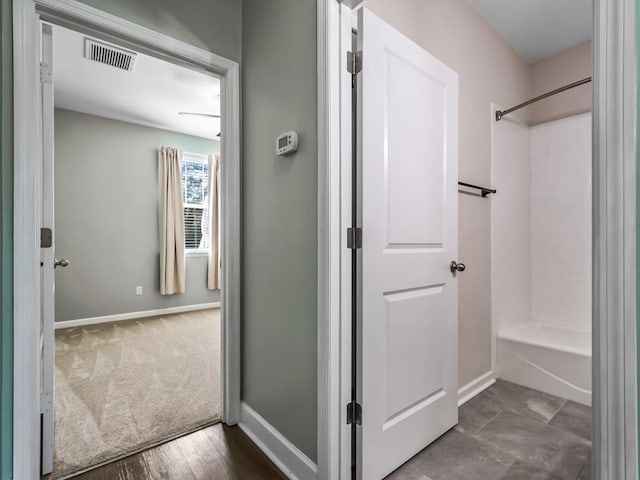 bathroom with shower / bathing tub combination