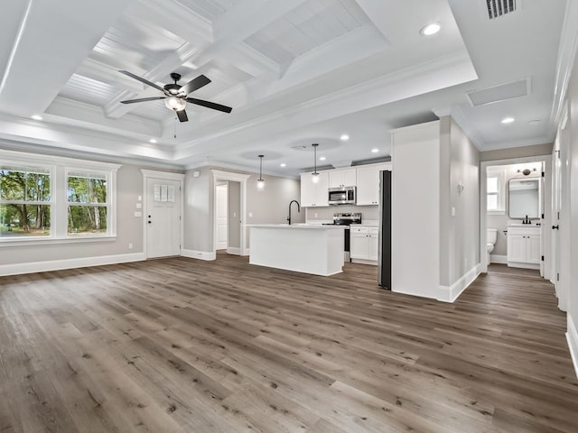 70 Beeler Rd, Crawfordville, FL 32327 - unfurnished living room featuring ornamental molding, healthy amount of natural light, recessed lighting, dark wood-style floors, and ceiling fan