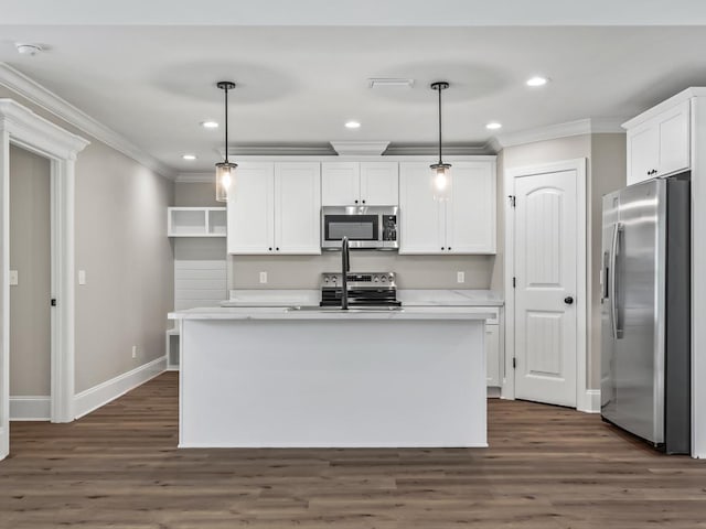 70 Beeler Rd, Crawfordville, FL 32327 - kitchen featuring stainless steel appliances, crown molding, white cabinets, dark wood finished floors, and light countertops