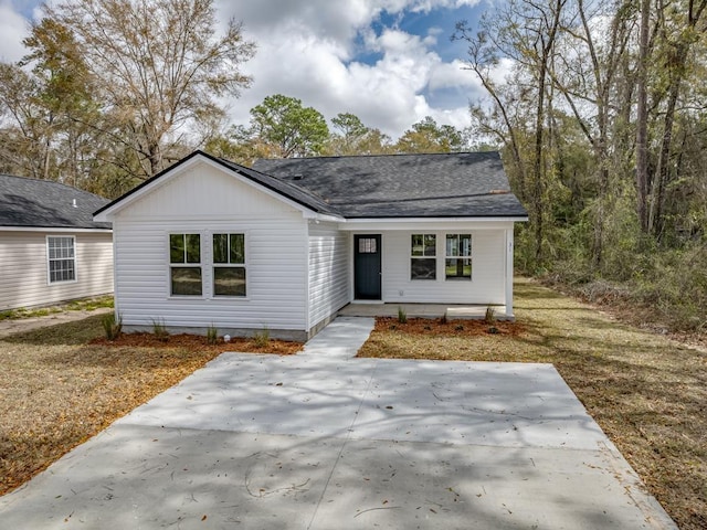 70 Beeler Rd, Crawfordville, FL 32327 - bungalow featuring roof with shingles and a porch