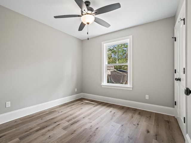 70 Beeler Rd, Crawfordville, FL 32327 - spare room featuring a ceiling fan and wood finished floors