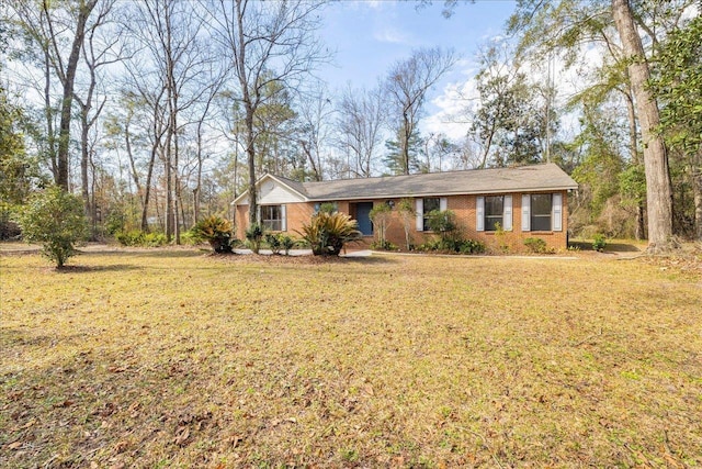 ranch-style house with a front yard