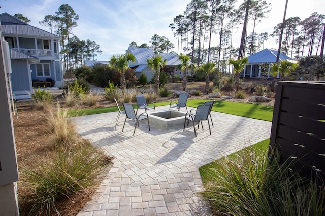 view of patio / terrace with a fire pit