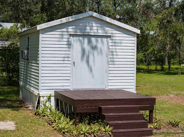 view of outdoor structure featuring a yard