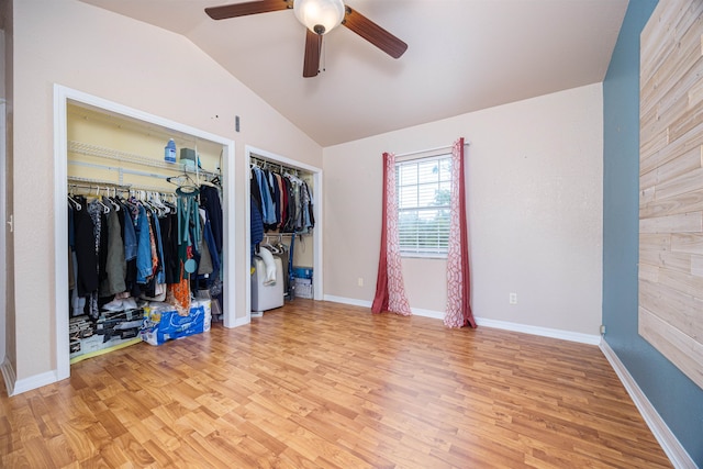 bedroom featuring light wood-type flooring, ceiling fan, and vaulted ceiling