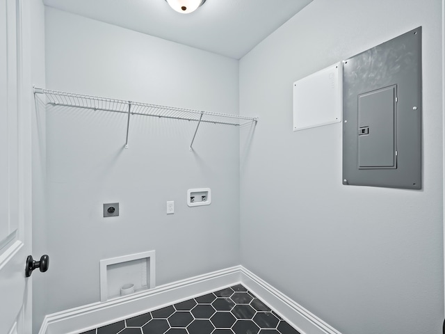 washroom featuring tile patterned flooring, electric dryer hookup, hookup for a washing machine, and electric panel