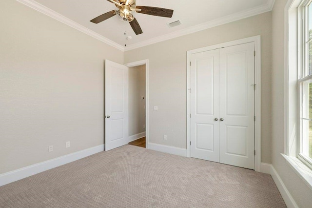 8451 Hickory Branch Trl, Tallahassee, FL 32312 - unfurnished bedroom featuring carpet flooring, crown molding, a closet, and ceiling fan