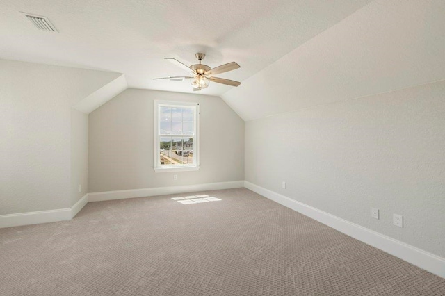 8451 Hickory Branch Trl, Tallahassee, FL 32312 - additional living space with lofted ceiling, ceiling fan, and light carpet