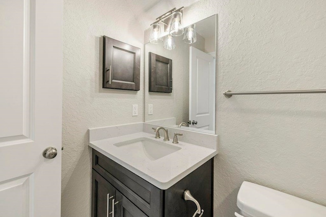 8451 Hickory Branch Trl, Tallahassee, FL 32312 - half bath featuring vanity and a textured wall