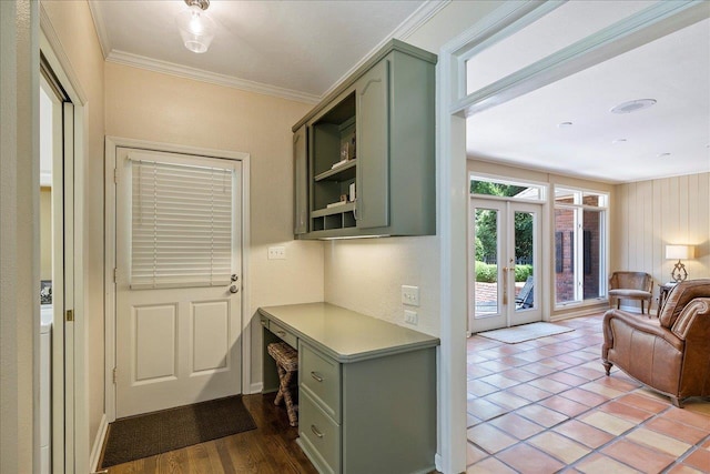 entryway featuring french doors and ornamental molding