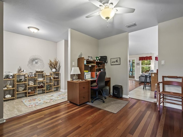 office space with ceiling fan and dark hardwood / wood-style flooring