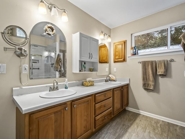 bathroom with vanity and an enclosed shower