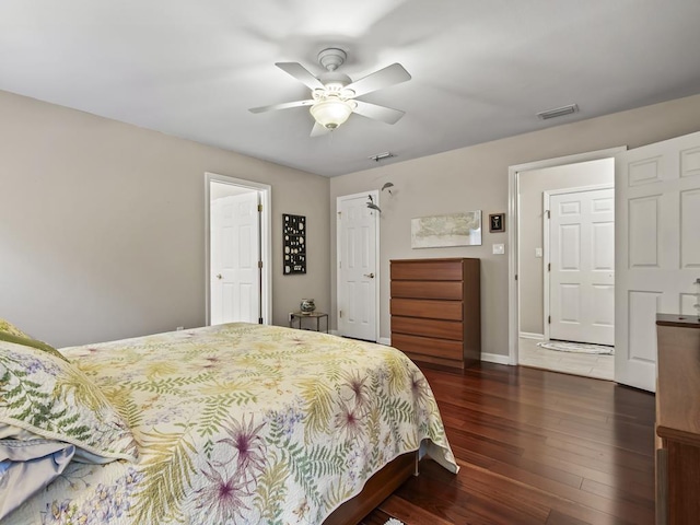 bedroom featuring dark hardwood / wood-style flooring and ceiling fan