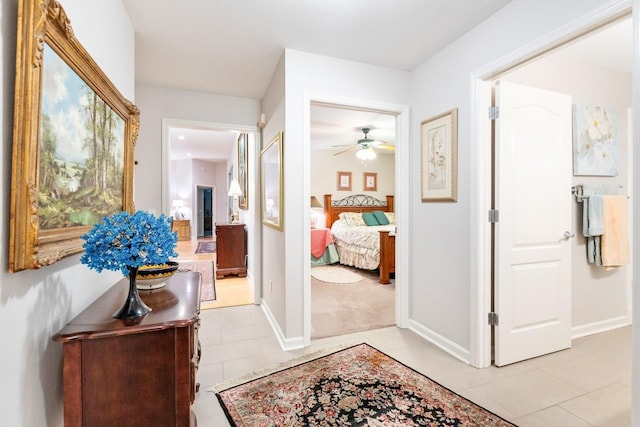 3540 Trillium Ct, Tallahassee, FL 32312 - hall with light tile patterned flooring and baseboards