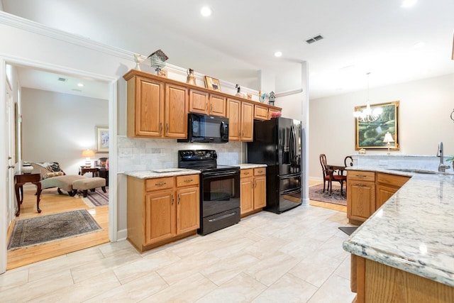3540 Trillium Ct, Tallahassee, FL 32312 - kitchen with black appliances, backsplash, recessed lighting, a chandelier, and hanging light fixtures