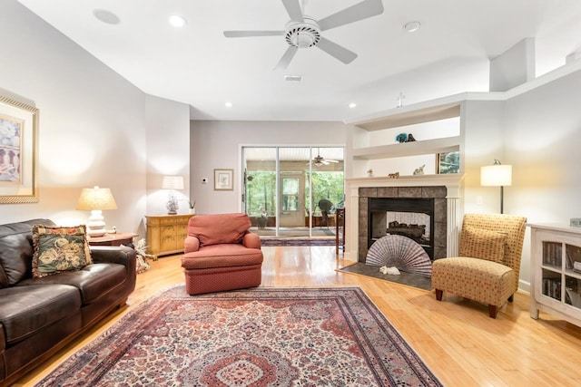 3540 Trillium Ct, Tallahassee, FL 32312 - living area featuring a ceiling fan, wood finished floors, a fireplace, and recessed lighting