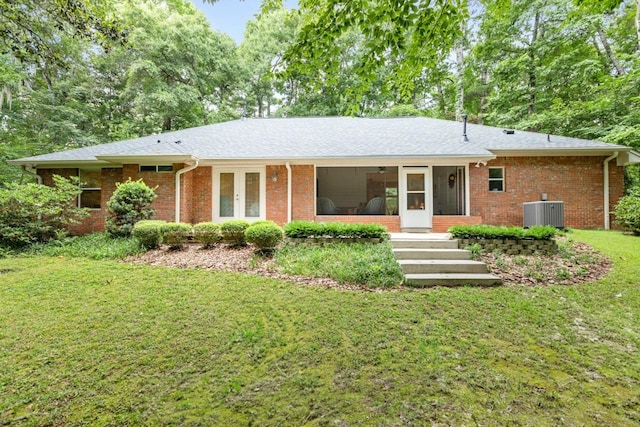 3540 Trillium Ct, Tallahassee, FL 32312 - ranch-style home featuring a front yard, brick siding, and a sunroom