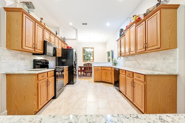 3540 Trillium Ct, Tallahassee, FL 32312 - kitchen featuring black appliances, backsplash, a peninsula, recessed lighting, and light stone countertops