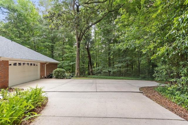 3540 Trillium Ct, Tallahassee, FL 32312 - garage featuring concrete driveway