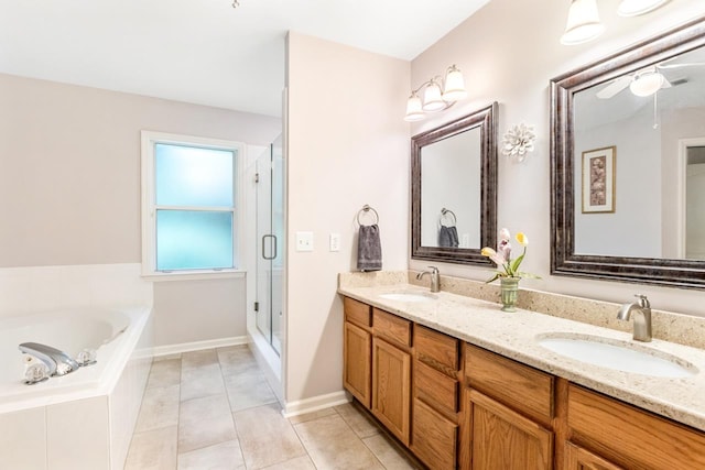 3540 Trillium Ct, Tallahassee, FL 32312 - full bathroom featuring double vanity, a garden tub, a shower stall, tile patterned flooring, and ceiling fan
