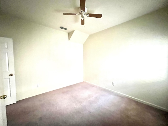 unfurnished room featuring carpet, ceiling fan, and lofted ceiling