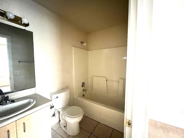 full bathroom featuring tile patterned flooring, vanity, toilet, and washtub / shower combination