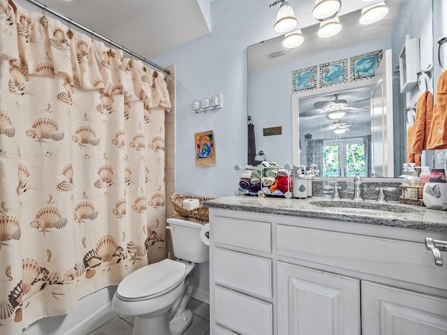 full bathroom featuring vanity, shower / tub combo with curtain, ceiling fan, and toilet