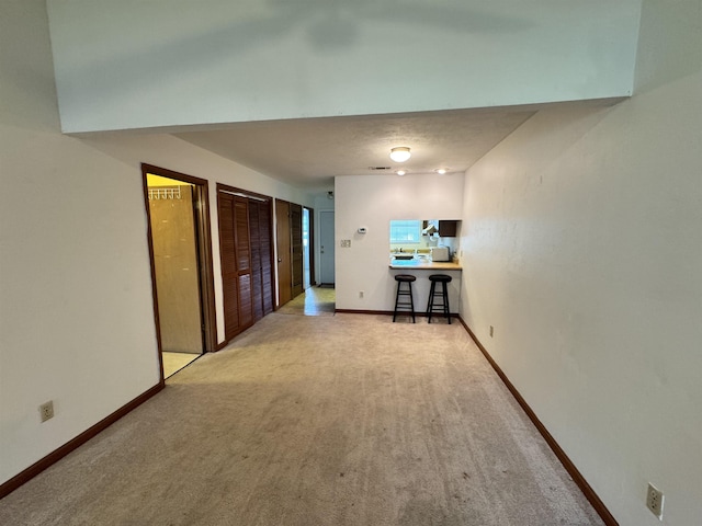 1108 Green Tree Ct Unit 1, Tallahassee, FL 32304 - living room featuring light colored carpet and baseboards