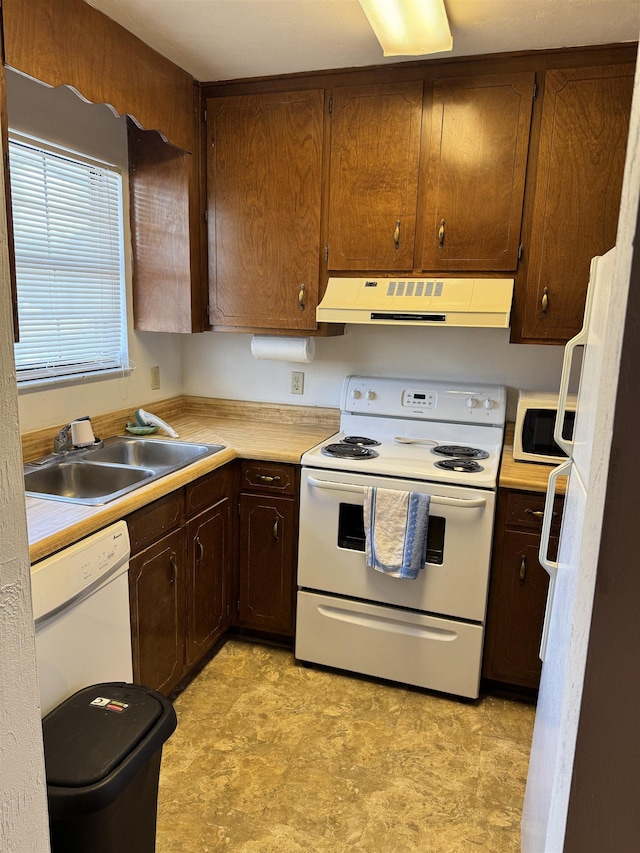 1108 Green Tree Ct Unit 1, Tallahassee, FL 32304 - kitchen featuring ventilation hood, white appliances, light countertops, and light floors