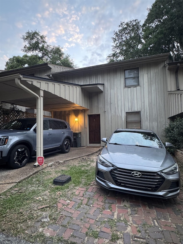 1838 Fernando Ln, Tallahassee, FL 32303 - view of home's exterior featuring a carport and board and batten siding