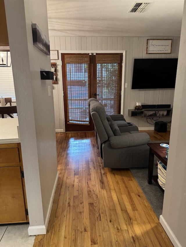 1838 Fernando Ln, Tallahassee, FL 32303 - living area featuring hardwood / wood-style flooring, french doors, and baseboards